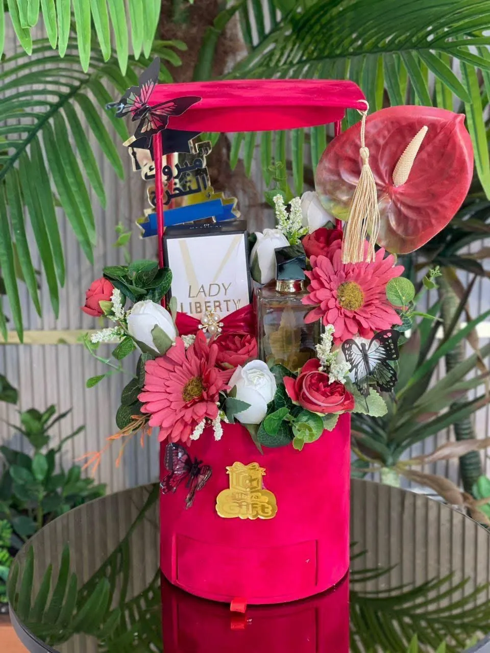 Graduation gift with perfume and flowers